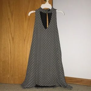 Sleeve less dress high neck deep v